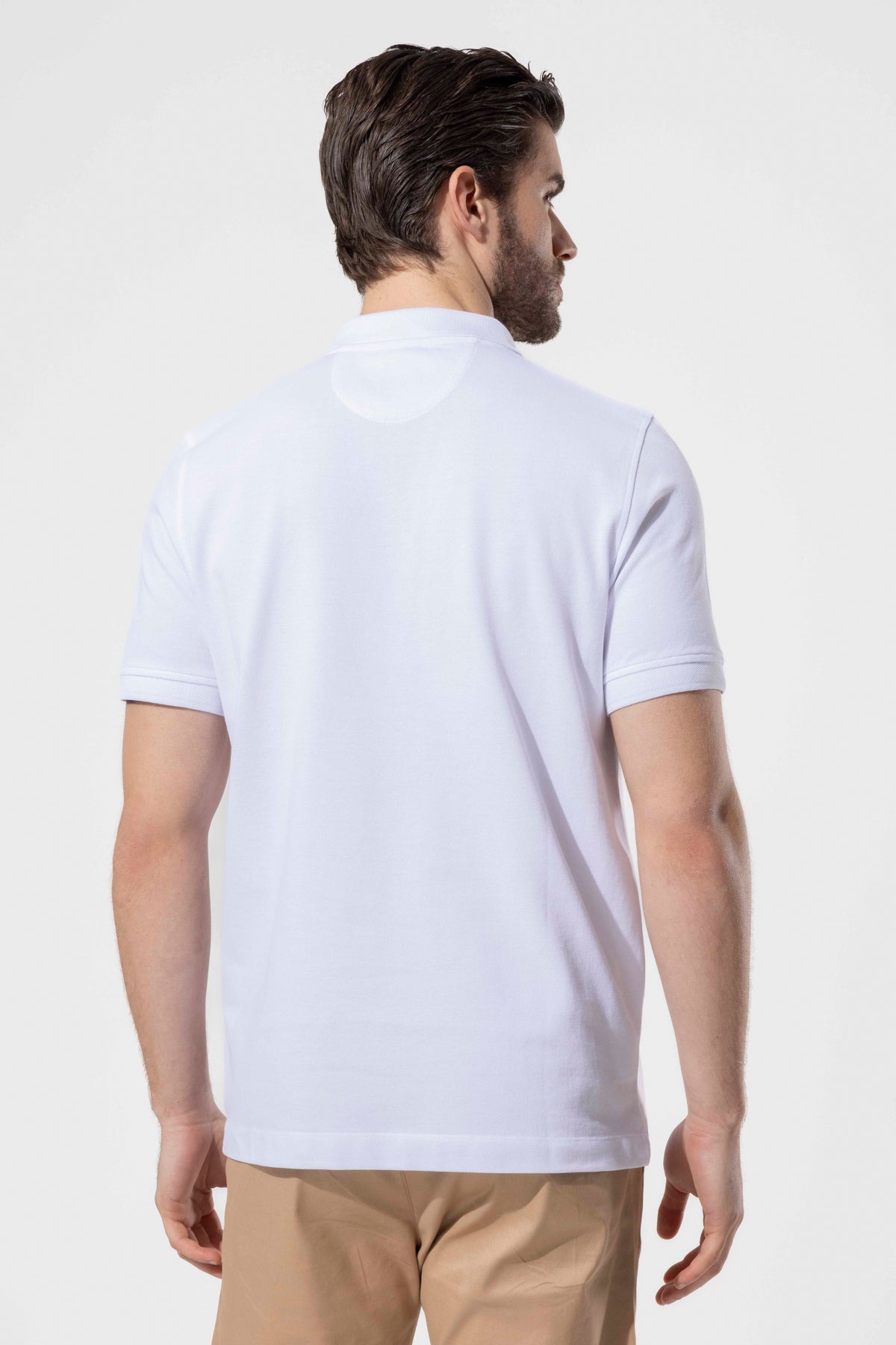 COVERED BUTTON POLO