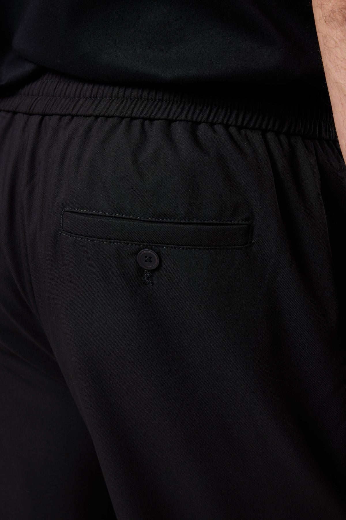 ELASTICATED WAIST TROUSERS