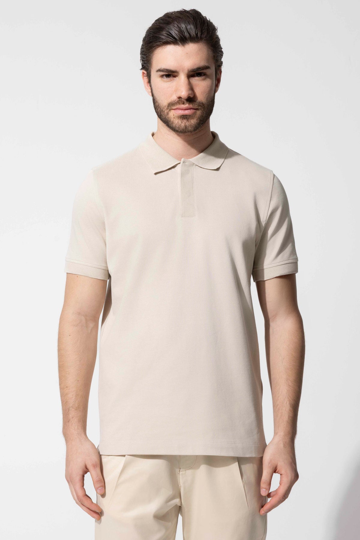 COVERED BUTTON POLO