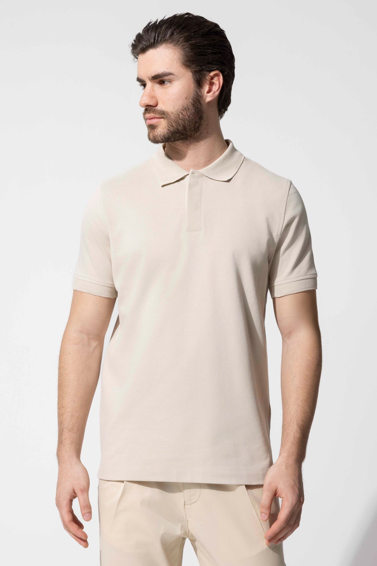 COVERED BUTTON POLO