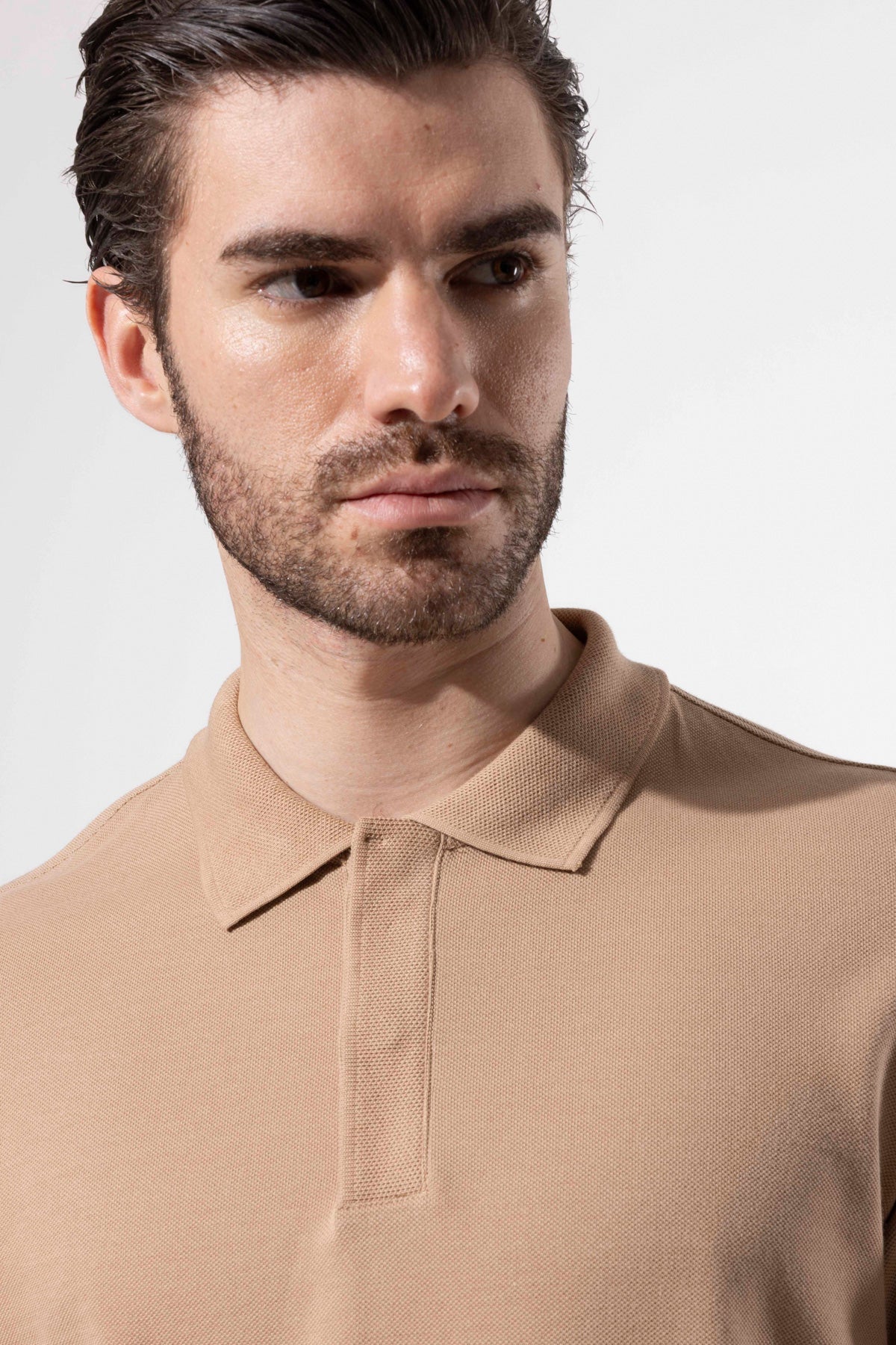 COVERED BUTTON POLO