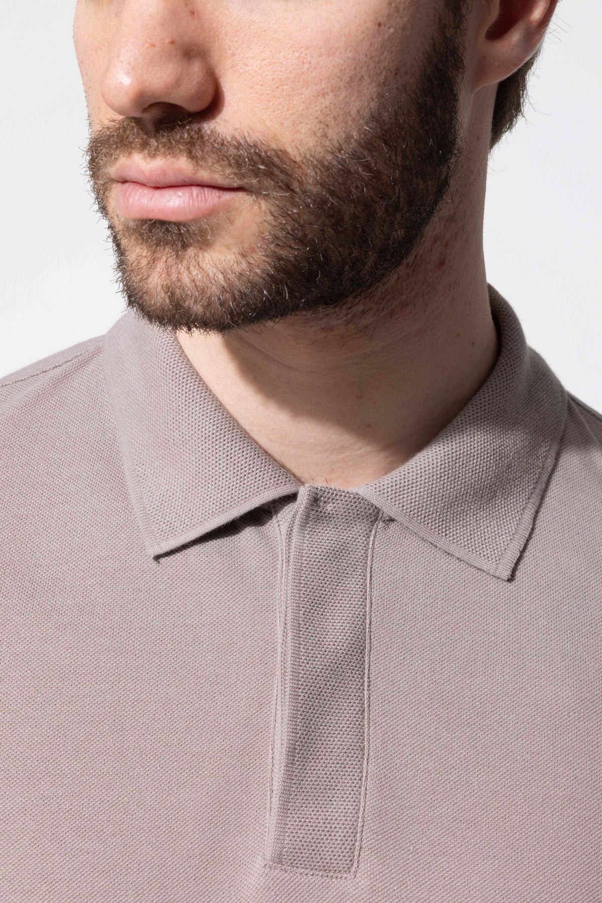 COVERED BUTTON POLO