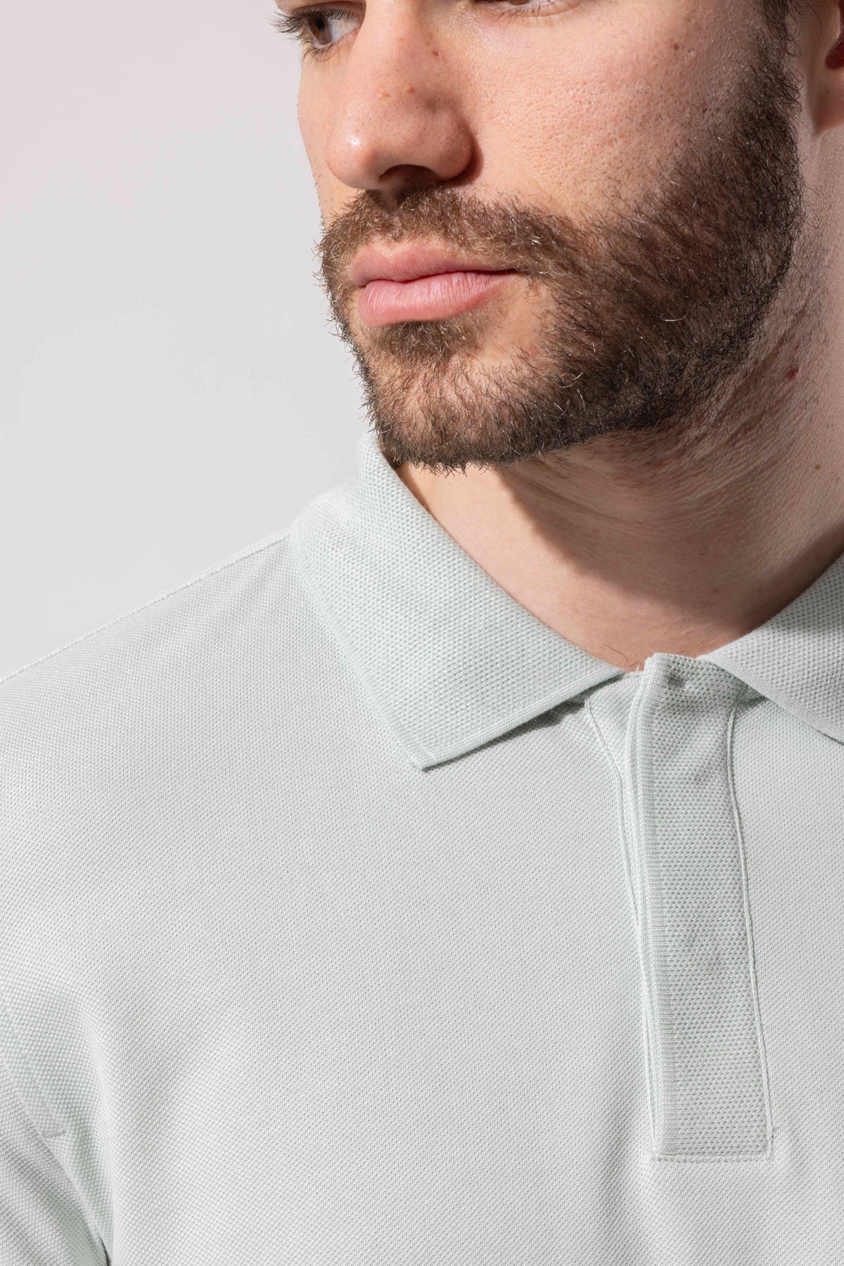 COVERED BUTTON POLO