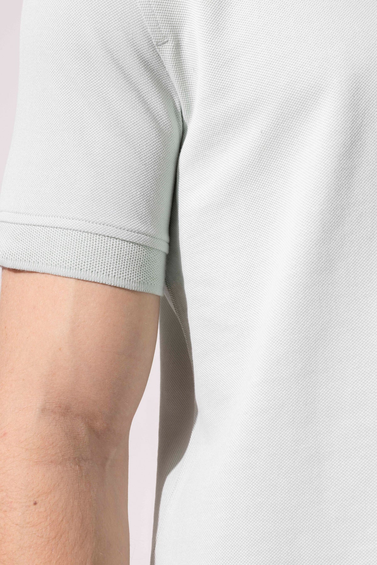 COVERED BUTTON POLO