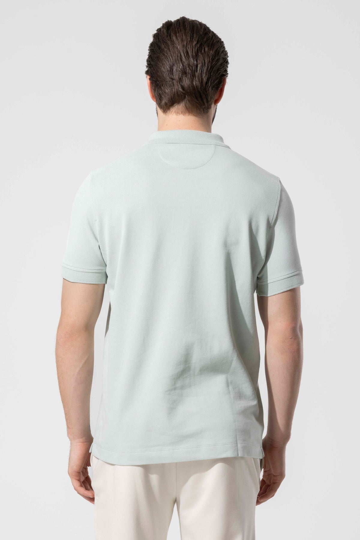 COVERED BUTTON POLO