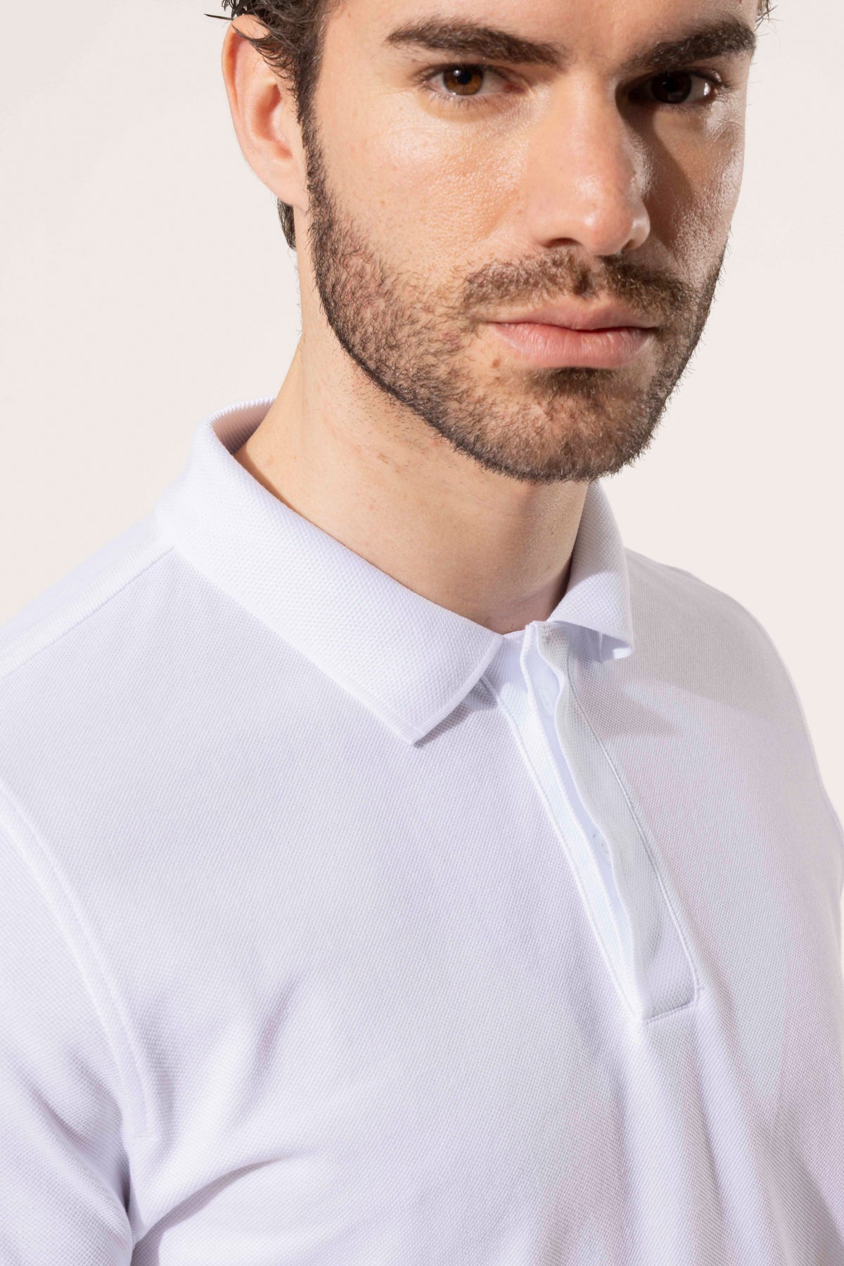 COVERED BUTTON POLO